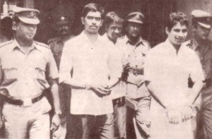 N. Thangathurai and Kuttimani Yogachandran amidst prison guards before they were massacred